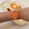 Traditional Orange Chakra Handmade Rakhi